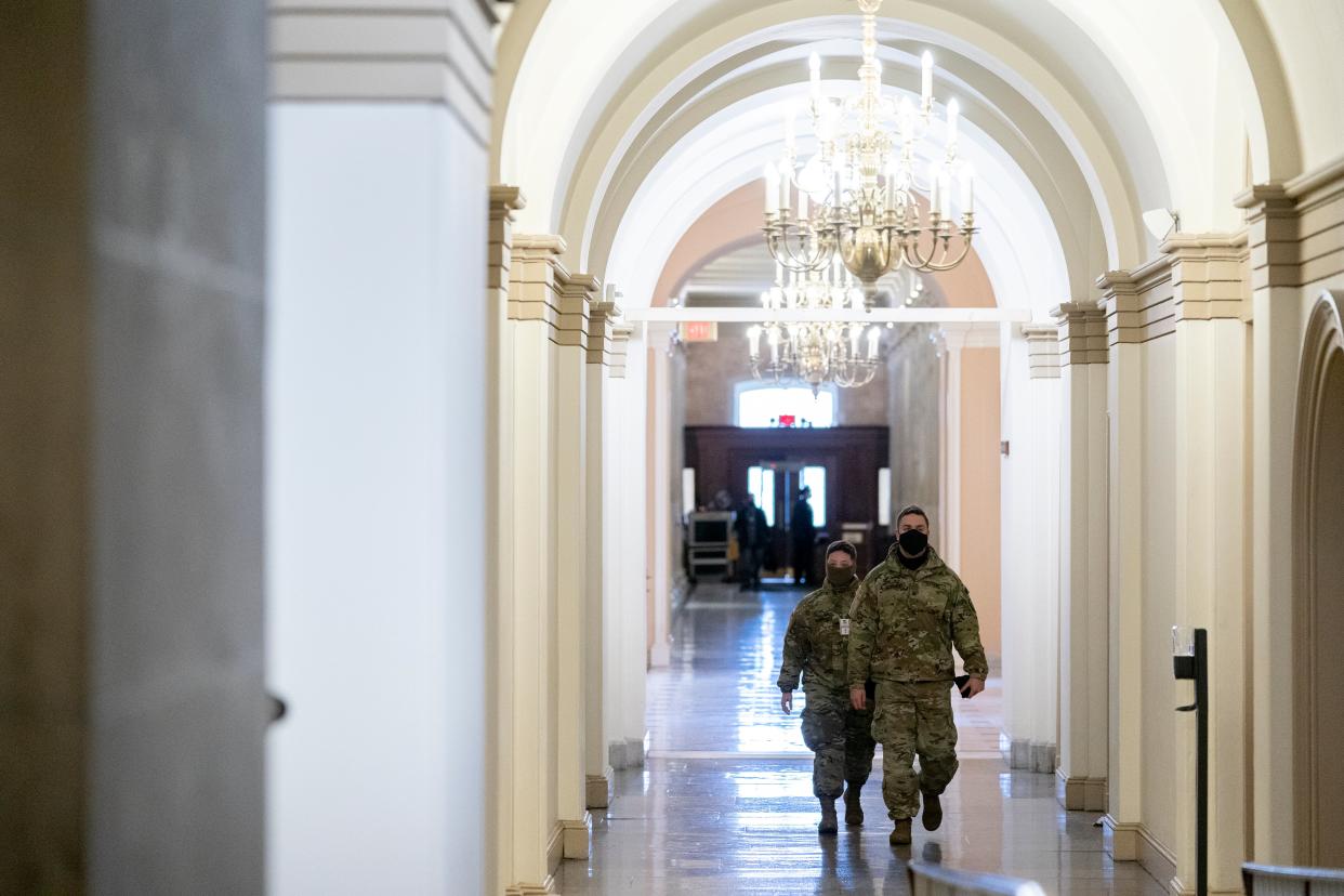 <p>Armed group ‘planning huge uprising’ in DC if Trump removed by 25th amendment, according to report</p> (Stefani Reynolds/Getty Images)