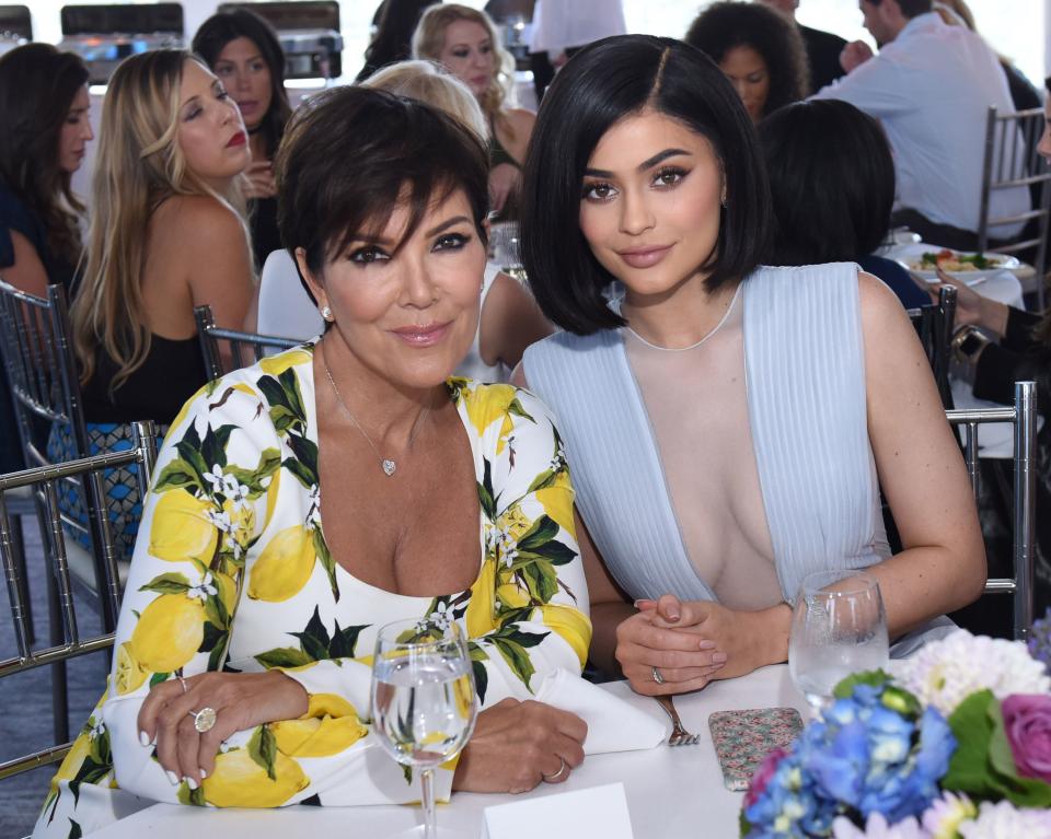 Kris and Kylie Jenner at event