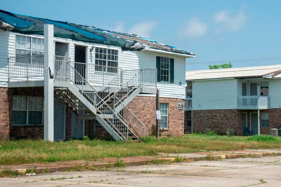 A damaged building with a missing roof at the Gulf Grove Apartments in Waveland on Friday, April 19, 2024. The city of Waveland condemned the apartments over the condition of the buildings and residents will have 30 days to move out. Hannah Ruhoff/Sun Herald