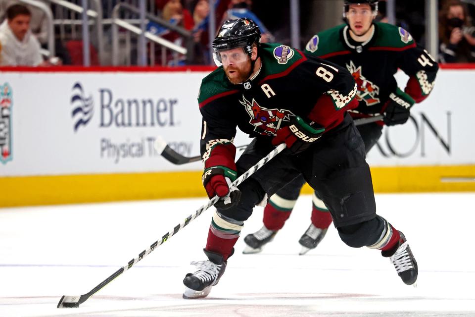 Jan 15, 2022; Glendale, Arizona, USA; Arizona Coyotes right wing Phil Kessel (81) moves the puck during the first period \aac\ at Gila River Arena. Mandatory Credit: Mark J. Rebilas-USA TODAY Sports