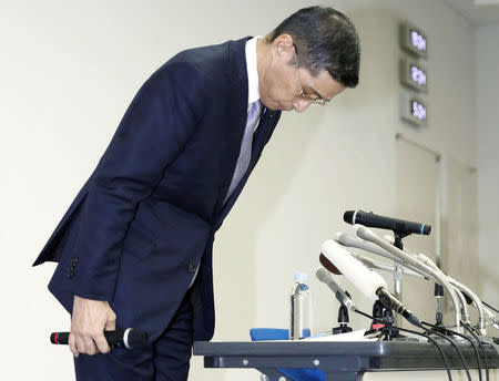 Nissan Motor Co. Chief Executive Hiroto Saikawa bows at a news conference at the company headquarters in Yokohama, south of Tokyo, Japan, in this photo taken by Kyodo October 19, 2017. Mandatory credit Kyodo/via REUTERS