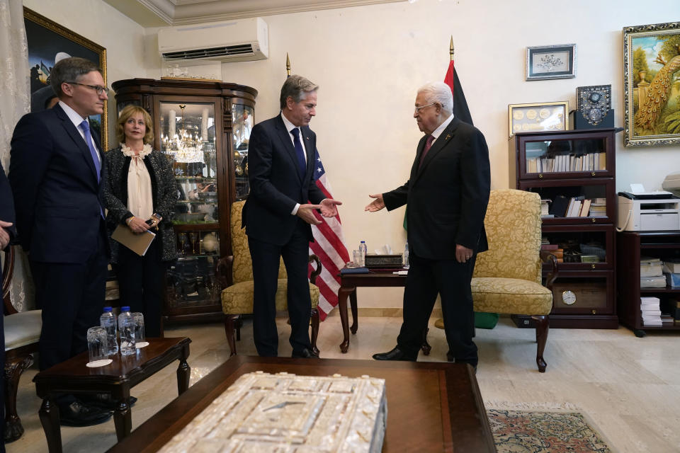 FILE - Palestinian President Mahmoud Abbas, right, and Secretary of State Antony Blinken arrive for their meeting in Amman, Jordan, Oct. 13, 2023. AP Washington photographer Jacquelyn Martin recalls how being one of a few female photographers covering news and politics was useful when she was assigned as the press pooler for Blinken's last-minute trip to Israel and the Middle East in the aftermath of the Hamas attacks. Martin said, “Sometimes people not knowing what to make of you works in your favor.” (AP Photo/Jacquelyn Martin, Pool, File)