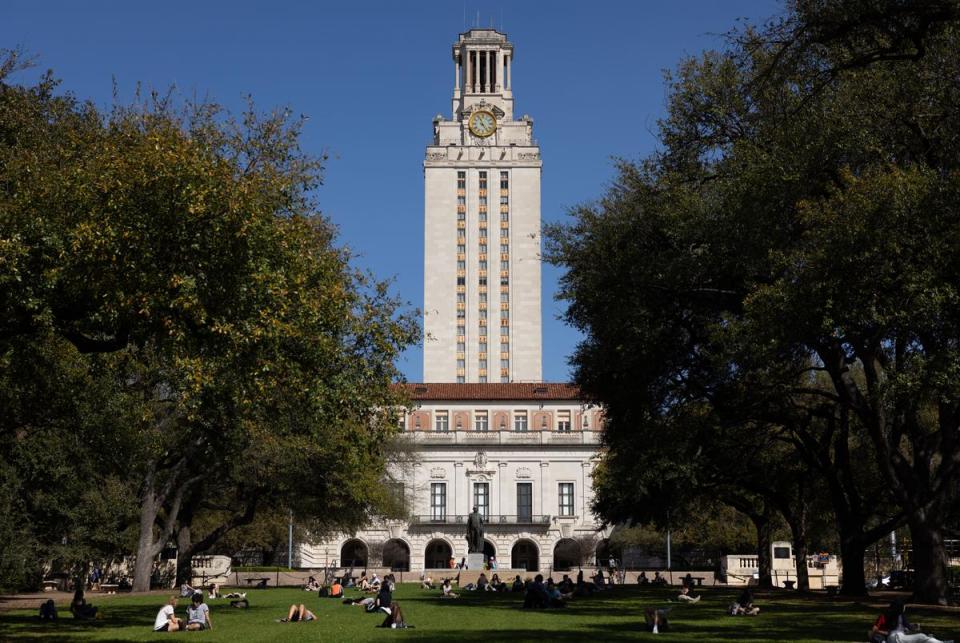 Student talk, sit and read on the South Mall a the University of Texas at Austin on Feb. 22, 2024. The UT Tower is located north of the South Mall.