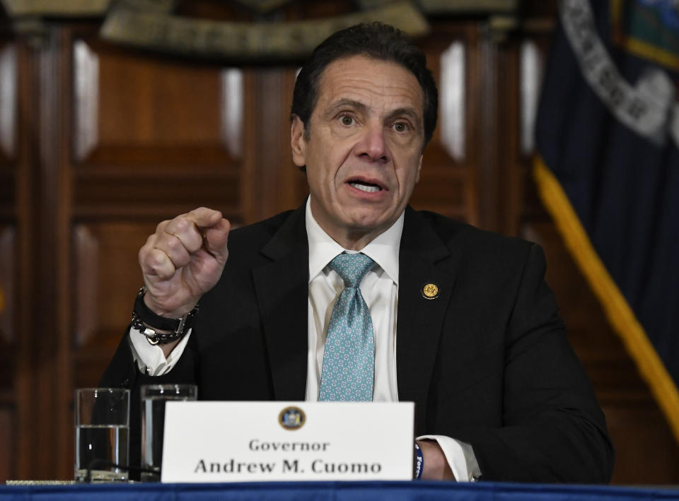 FILE- In this Jan. 29, 2019 file photo, New York Gov. Andrew Cuomo holds a news conference in the Red Room at the state Capitol in Albany, N.Y. Cuomo says he's directing state health officials to ban the sale of flavored e-cigarettes, citing the risk of young people getting addicted to nicotine. The Democrat announced Sunday, Sept. 15 that the state health commissioner would be making a recommendation this week to the state Public Health and Health Planning Council. (AP Photo/Hans Pennink, File)