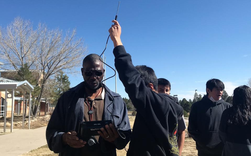 Mescalero Apache High School Biology teacher Nate Raynor leads his class in a discussion about air temperatures and polluntants during a class on April 4, 2022.