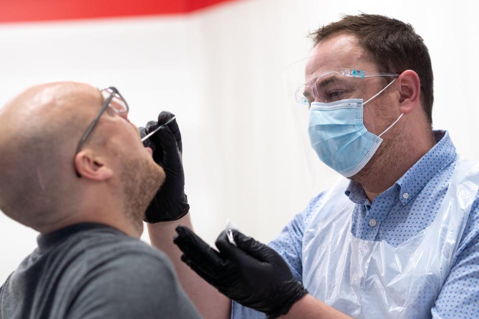 A coronavirus test being conducted (LHR AIRPORTS LIMITED/AFP via Get)