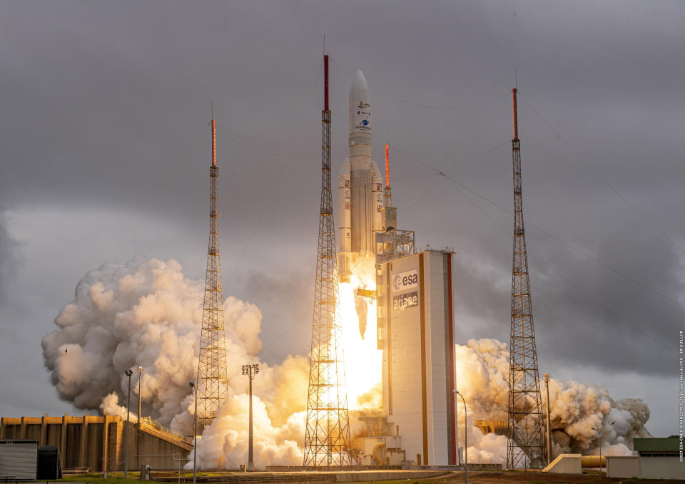 Arianespace's Ariane 5 rocket with NASA's James Webb Space Telescope onboard, lifts off Saturday, Dec. 25, 2021, at Europe's Spaceport, the Guiana Space Center in Kourou, French Guiana. The world's largest and most powerful space telescope has blasted off on a high-stakes quest to behold light from the first stars and galaxies. NASA's James Webb Space Telescope rocketed away Saturday from French Guiana in South America. (ESA-CNES-ARIANESPACE via AP)