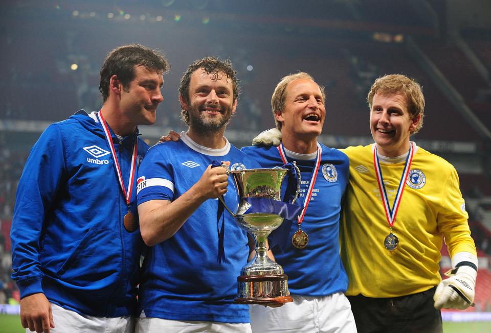 (L-R) Joe Calzaghe, Michael Sheen, Woody Harrelson and Patrick Kielty celebrate winning the 2010 Socceraid match at Old Trafford