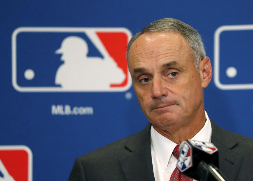 MLB commissioner Rob Manfred is aiming to make games shorter. (AP) 