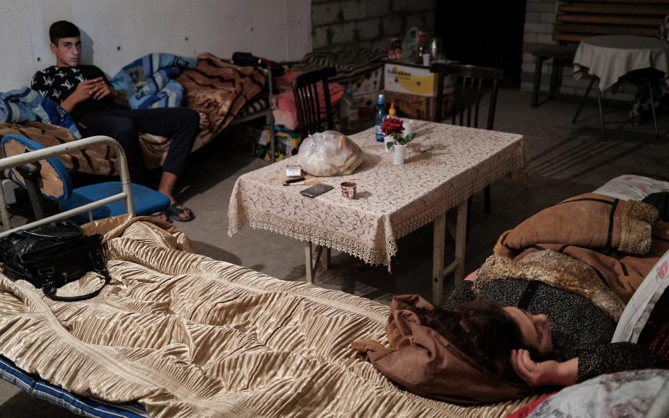 People in a basement used as a shelter in Stepanakert  - Foreign Ministry of Armenia
