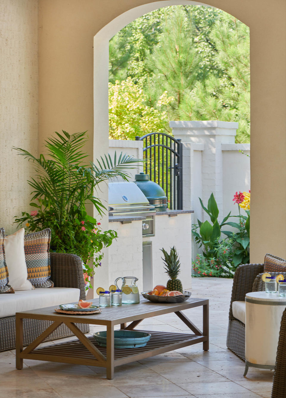 Incorporate plants into your outdoor kitchen design.