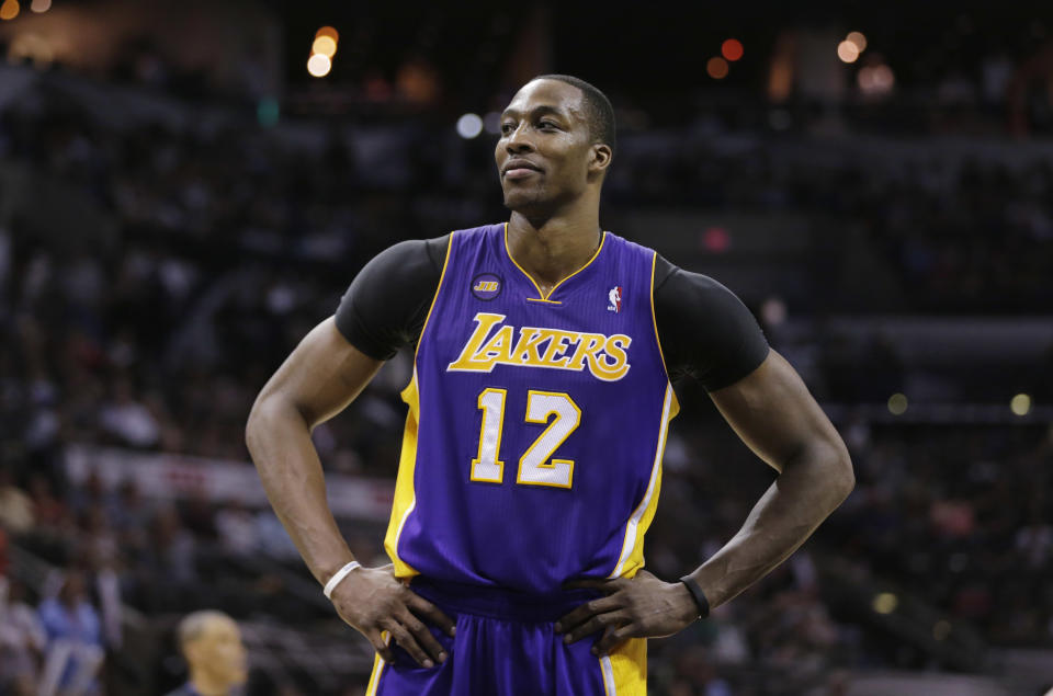 Los Angeles Lakers' Dwight Howard during the second half of Game 1 of an NBA playoffs basketball game against the San Antonio Spurs, Sunday, April 21, 2013, in San Antonio. San Antonio won 91-79. (AP Photo/Eric Gay)