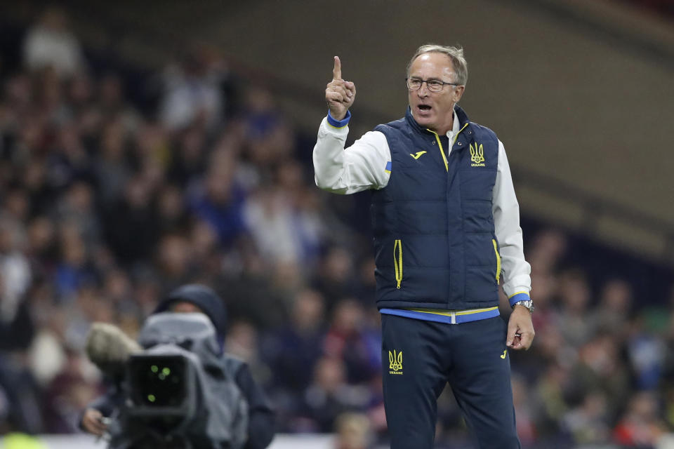 Ukrainian head coach Oleksandr Petrakov gestures during the UEFA Nations League soccer match between Scotland and Ukraine, at Hampden Park, in Glasgow, Scotland, Wednesday, Sept. 21, 2022. (AP Photo/Scott Heppell)