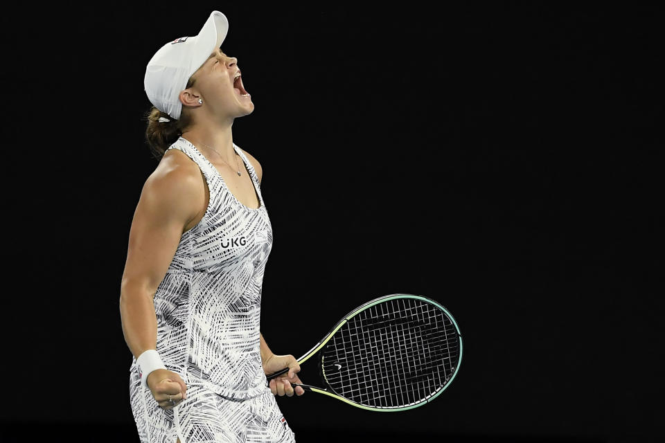 Ash Barty of Australia celebrates after defeating Danielle Collins of the U.S., in the women's singles final at the Australian Open tennis championships in Saturday, Jan. 29, 2022, in Melbourne, Australia. (AP Photo/Andy Brownbill)