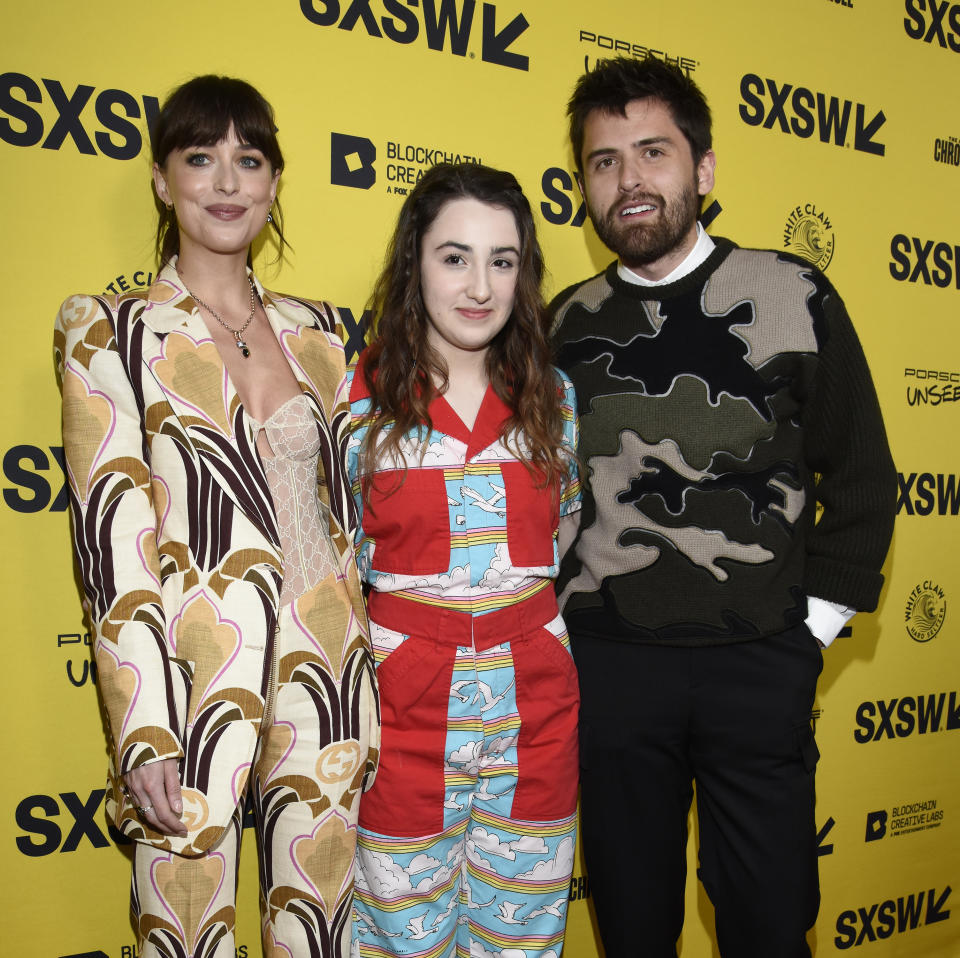 AUSTIN, TEXAS - MARCH 18: (L-R) Dakota Johnson, Vanessa Burghardt, and Cooper Raiff attend the premiere of 