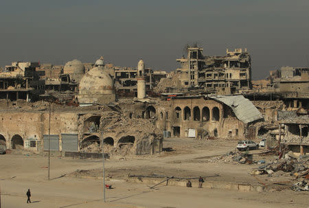 Destroyed buildings from previous clashes are seen in Mosul, Iraq, January 10, 2018. Picture taken January 10, 2018. To match Special Report IRAQ-MOSUL/OFFICIAL REUTERS/Ari Jalal