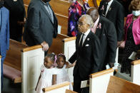 Rev. Al Sharpton at a funeral service for Brianna Grier with her twin three-year-old daughters Thursday, Aug. 11, 2022, in Atlanta. The 28-year-old Georgia woman died after she fell from a moving patrol car following her arrest. (AP Photo/John Bazemore)
