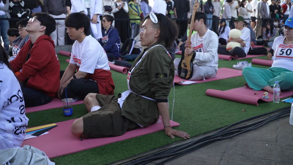 26-year-old YouTuber Kim Seok-hwan zones out as he participates in the annual Space-out competition held on Sunday in Seoul. - CNN