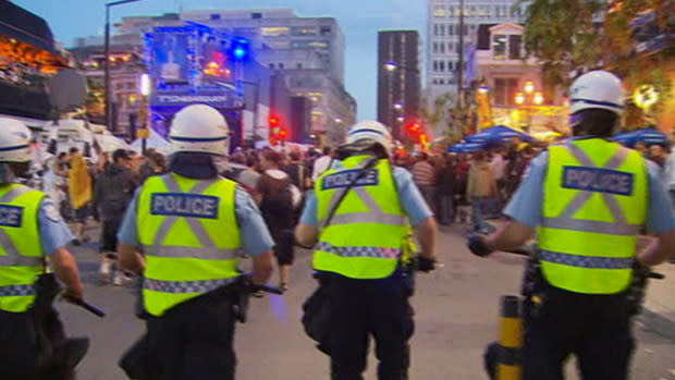 Police block the approach to downtown Montreal's Crescent Street, where a Grand Prix street party was taking place Friday night. 