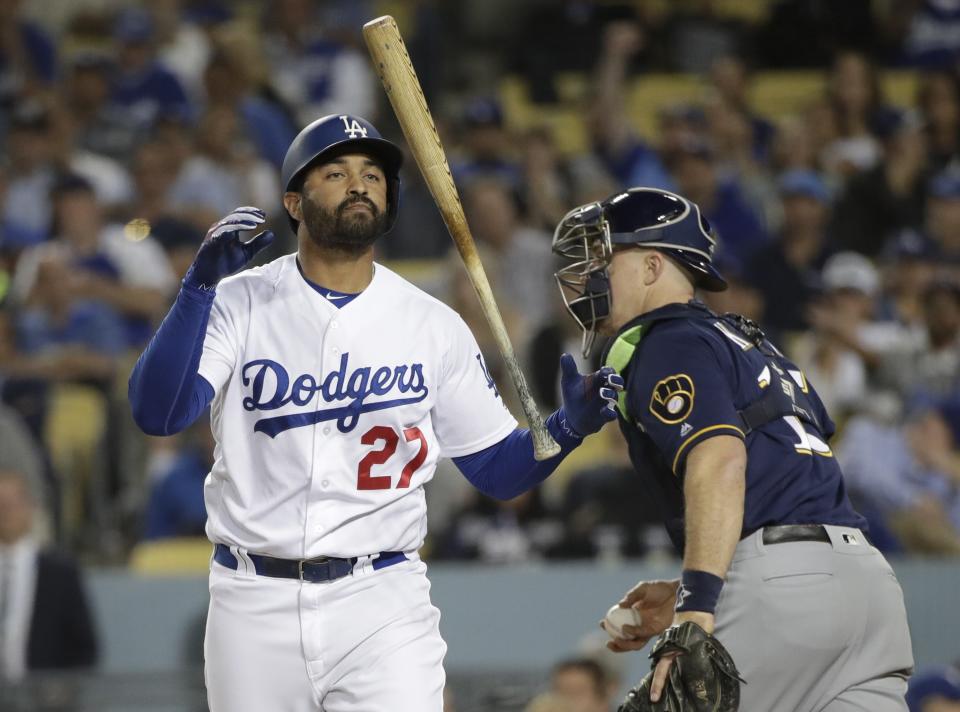 Los Angeles Dodgers' Matt Kemp reacts after striking out during the eighth inning of Game 3 of the National League Championship Series baseball game against the Milwaukee Brewers Monday, Oct. 15, 2018, in Los Angeles. (AP Photo/Jae Hong)