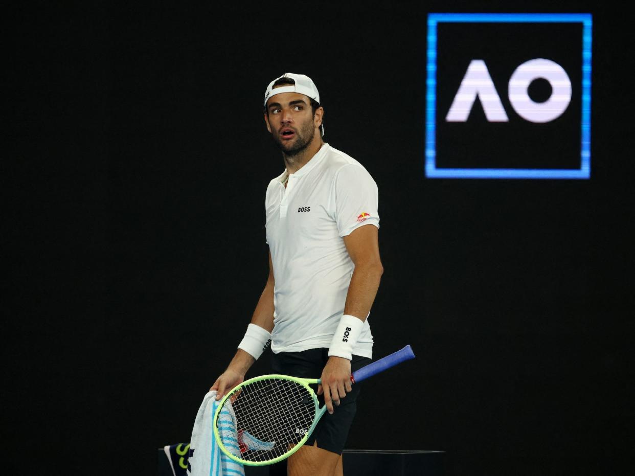 Matteo Berrettini reacts during his first-round loss at the 2023 Australian Open.