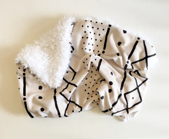 <a href="https://www.etsy.com/listing/505980040/mud-cloth-baby-blanket-faux-fur-minky" target="_blank">Shop it here</a>.&nbsp;