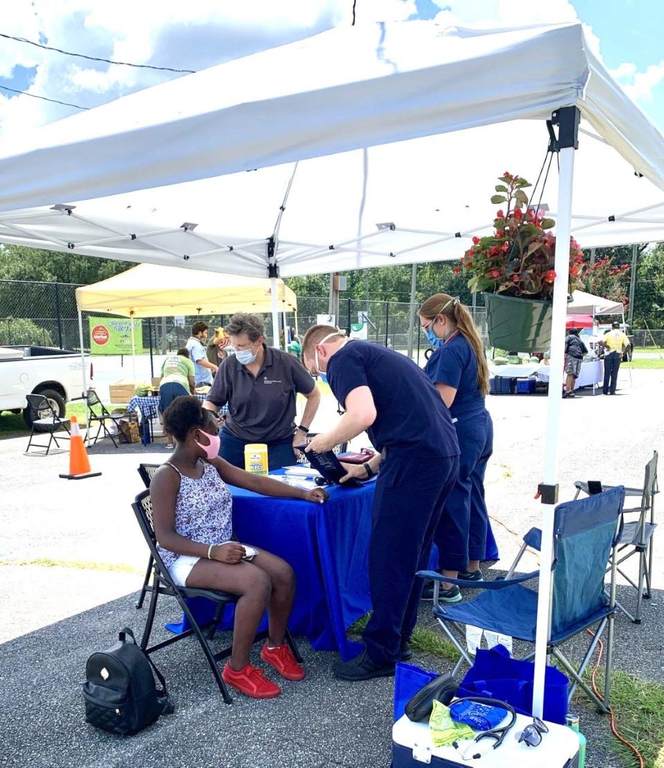 Free health screenings are available at the market.