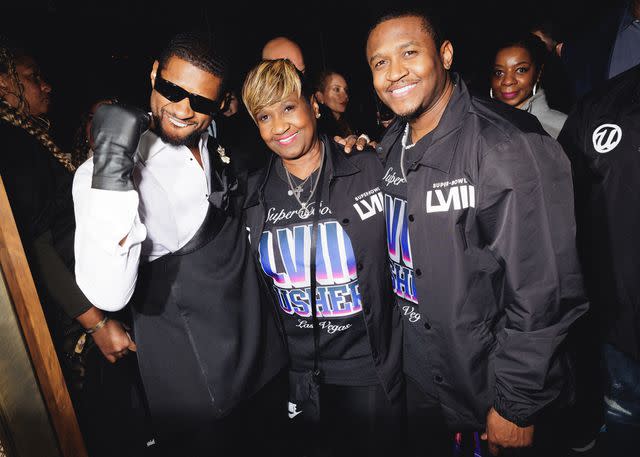 <p>Courtesy of BFA.com / Marc Patrick</p> Usher with Mom Jonetta Patton and Brother J. Lack