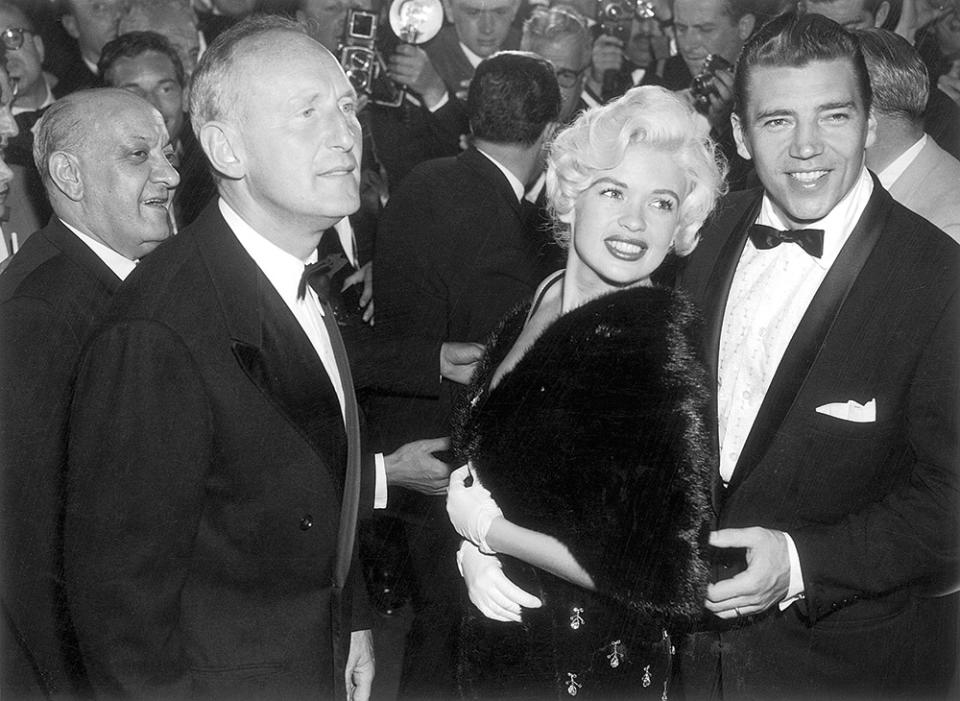 From left French actor and comedian Bourvil, Jayne Mansfield and her husband, Mickey Hargitay, at a screening of Jacques Tati’s My Uncle in 1958.