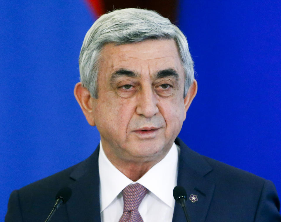 FILE In this file photo taken on Wednesday, March 15, 2017, Armenian President Serge Sarkisian speaks after talks with Russian President Vladimir Putin in the Kremlin in Moscow, Russia. Armenians are set to cast ballots Sunday in the first parliamentary elections since the ex-Soviet nation modified its constitution to expand powers of parliament and prime minister. (Sergei Chirikov/Pool Photo via AP, file)