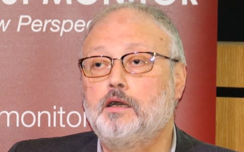 Saudi dissident Jamal Khashoggi speaking at an event hosted by Middle East Monitor in London  - Credit: REUTERS
