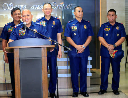 Philippine National Police (PNP) Chief Ronald dela Rosa with police Senior Superintendent Graciano Mijares (R), newly-appointed head of the PNP drug enforcement group, during the re-launch of police anti-narcotics operations at a news conference inside the police headquarters in Quezon city, metro Manila, Philippines March 6, 2017. REUTERS/Romeo Ranoco