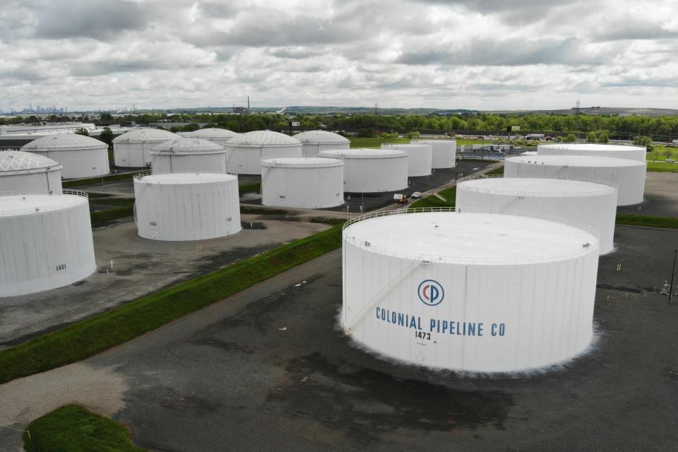 Colonial Pipeline storage tanks are seen in Woodbridge, N.J., on Monday, May 10, 2021.