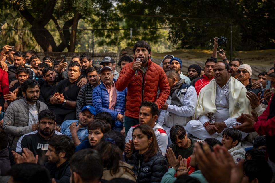 Indian wrestler Bajrang Punia, center, speaks during a protest (AP)