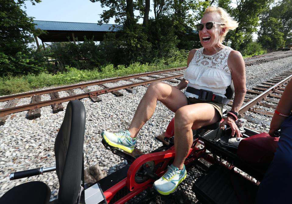 Courier Journal reporter Kirby Adams was excited to take off on a Rail Explorers railbike in Versailles, Ky. on July 27, 2023.  The company offered a tour of their new Versailles location which features a 10-mile round-trip scenic view of bourbon distilleries and horse farms in the area. 