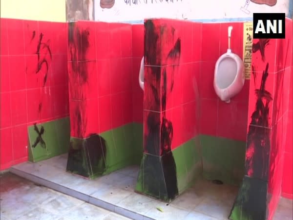 Party workers alleged that Samajwadi Party's symbolic green and red colors were used in the tiles of a toilet in Gorakhpur Railway Hospital. (Photo/ANI)