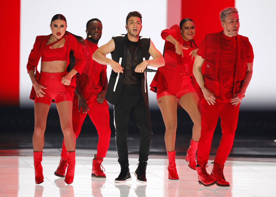 Luca Hanni of Switzerland performs the song 'She Got Me" during the 2019 Eurovision Song Contest grand final in Tel Aviv, Israel, Saturday, May 18, 2019. (AP Photo/Sebastian Scheiner)