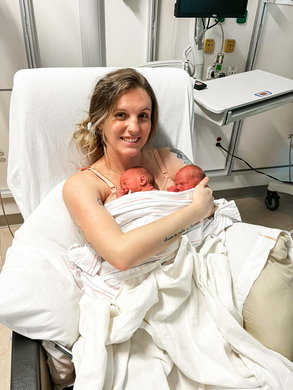 Mom of three Meghan Huston, holding both of her newborn twin boys for the first time. (Courtesy Meghan Huston)