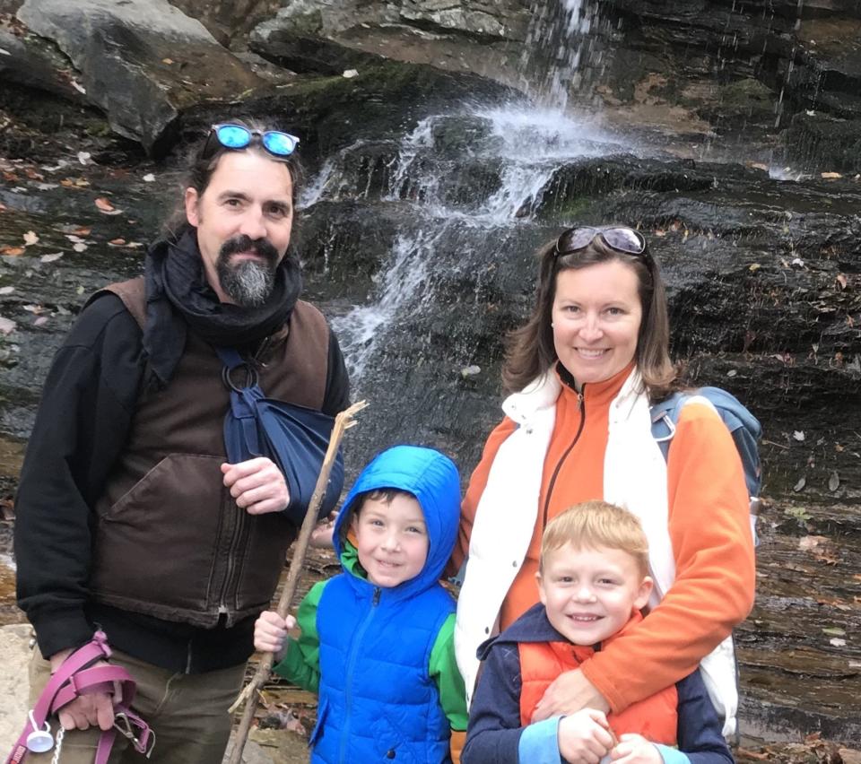 Ginny Bowen Olson with her husband and two sons