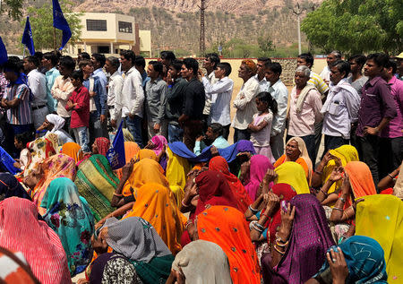 FILE PHOTO: People belonging to the Dalit community take part in a nationwide strike called by several Dalit organisations, in Kasba Bonli, Rajasthan, India, April 2, 2018. REUTERS/Krishna N. Das