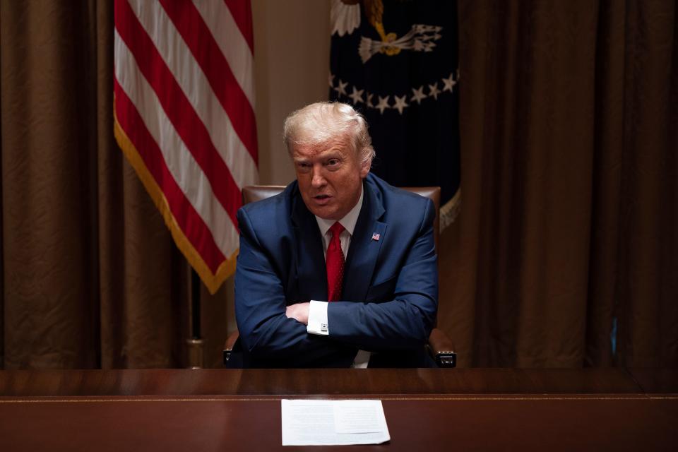 President Trump speaks to reporters at the White House in Washington, D.C., on Thursday. (Photo by Jim Watson/AFP via Getty Images)