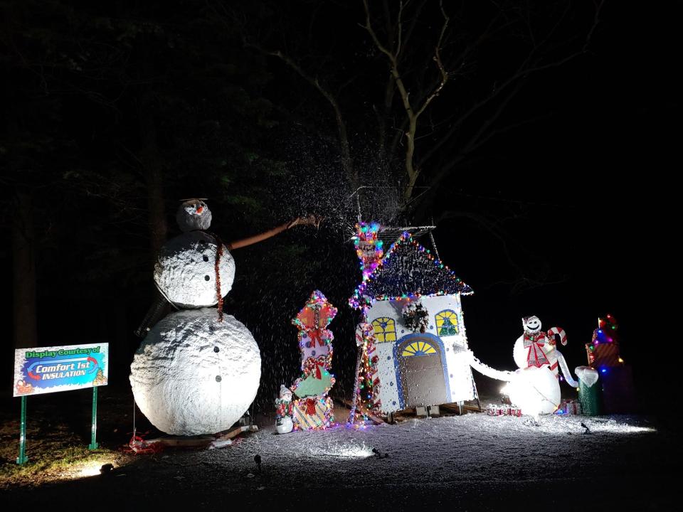 The Comfort 1st Insulation display at the Rockford Festival of Lights showers the area with "snow." A Rockford tradition, the free, drive-thru festival attracts tens of thousands of visitors each year.