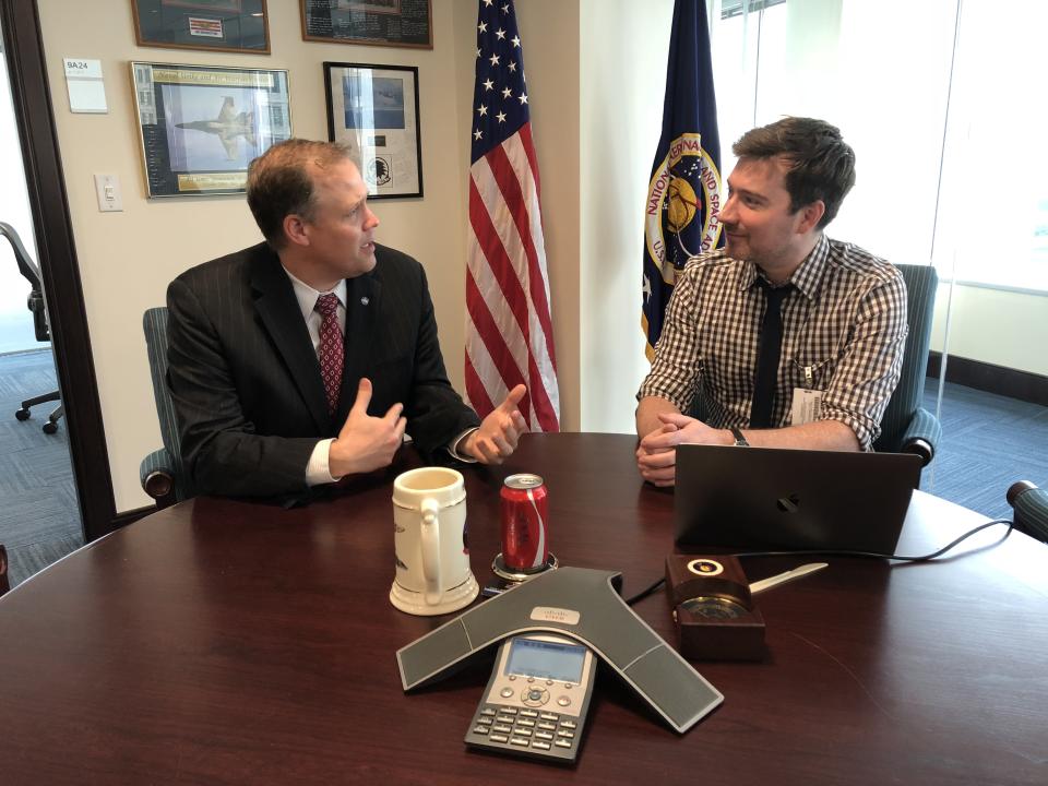 Yahoo News reporter Michael Walsh, right, interviews Jim Bridenstine in his office at the space agency’s headquarters in Washington, D.C. (Photo: Michael Walsh/Yahoo News)