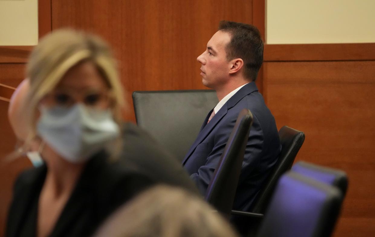 Suspended intensive-care physician William Husel sits at the defense table at the start of a hearing Wednesday in Franklin County Common Pleas Court on a motion to dismiss 25 counts of murder against him.