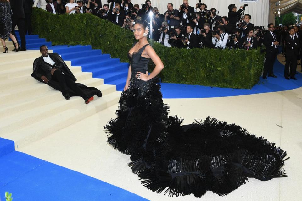 Cassie, pictured attending the Met Gala with the singer during their relationship, filed a suit alleging rape, abuse and sex trafficking; the singer settled the suit the next day for an undisclosed sum (Dia Dipasupil/Getty Images For Entertainment Weekly)