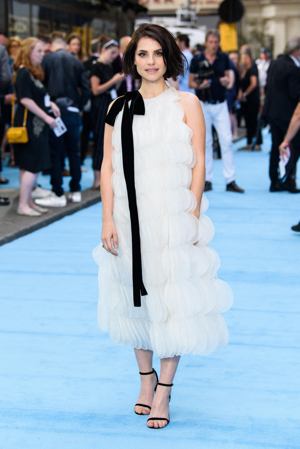 <p>For the 4 July London premiere of ‘Swimming with Men’, actress Charlotte Riley donned a frothy Oscar de la Renta dress with nineties-inspired heels. <em>[Photo: Getty]</em> </p>