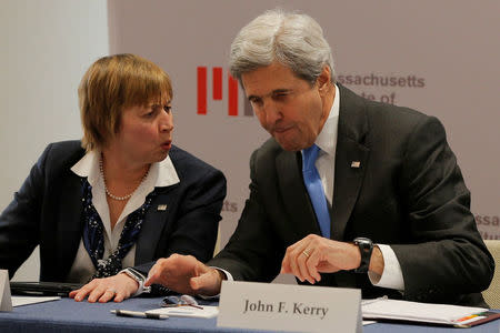 United States Secretary of State John Kerry and MIT Vice President for Research Maria Zuber (L) talk before a roundtable discussion about the "Future of Work" at Massachusetts Institute of Technology in Cambridge, Massachusetts, U.S. January 9, 2017. REUTERS/Brian Snyder