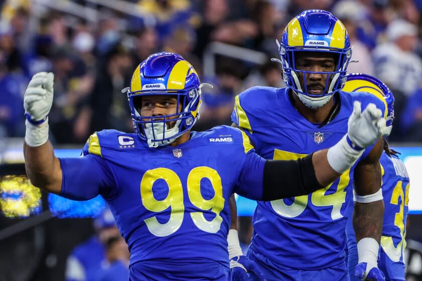 Inglewood, CA, Monday, January 17, 2022 - Los Angeles Rams defensive end Aaron Donald (99) encourages fans.