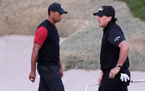 Tiger Woods and Phil Mickelson walk on the 18th hole during The Match: Tiger vs Phil at Shadow Creek Golf Course on November 23, 2018 in Las Vegas, Nevada - Credit: Getty Images 