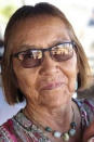 In this undated photo provided by her niece Seraphine Warren, Navajo rug weaver Ella Mae Begay, 62, is shown. Begay is one of thousands of missing Indigenous women in the U.S. Warren is organizing a 150-mile walk starting at Begay's home in the Navajo Nation community of Sweetwater, Ariz., on Tuesday, Sept. 28, 2021, to draw attention to the case amid renewed calls to highlight missing people of color following widespread coverage of a white woman who disappeared in Wyoming. (AP Photo)